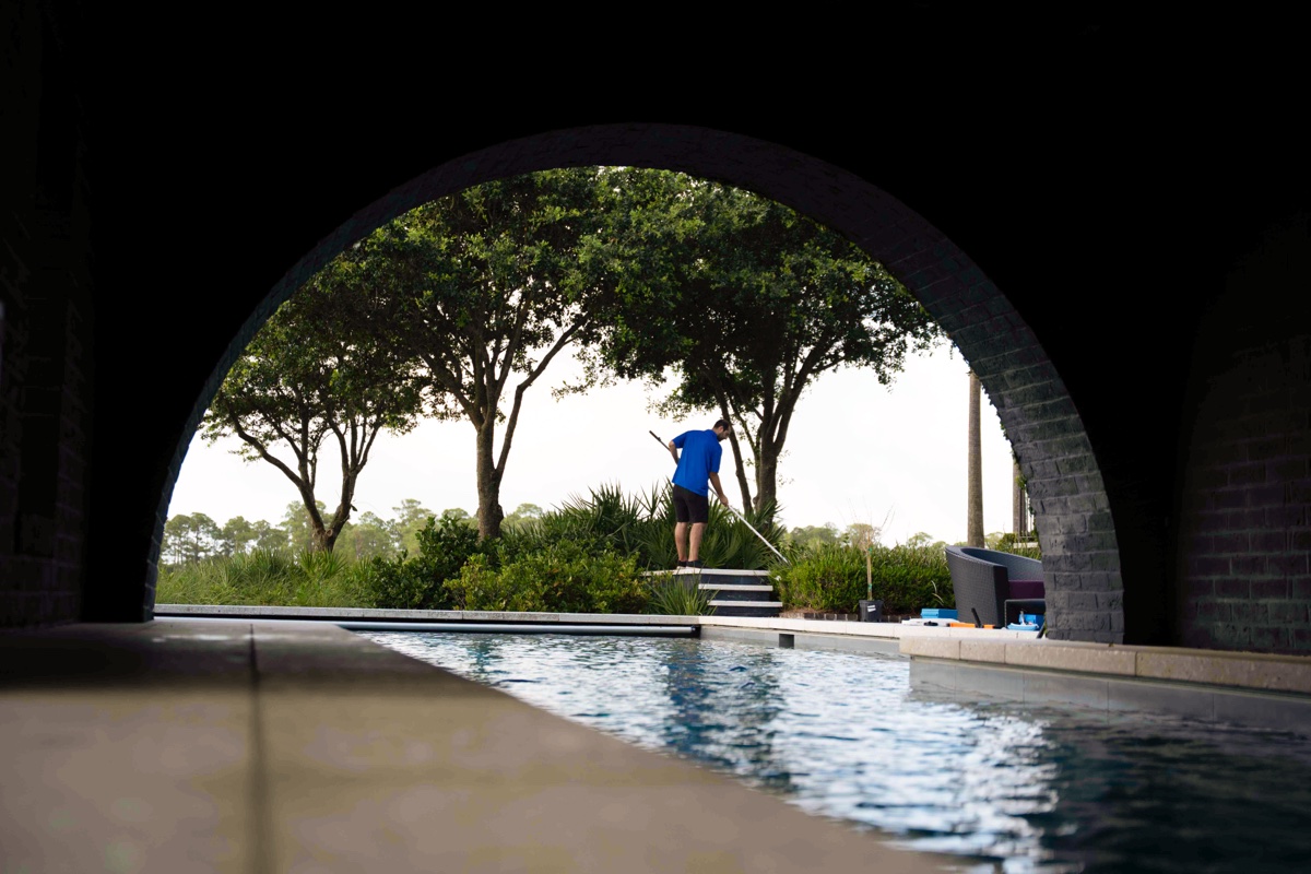 Pool technician servicing a pool on James Island, SC