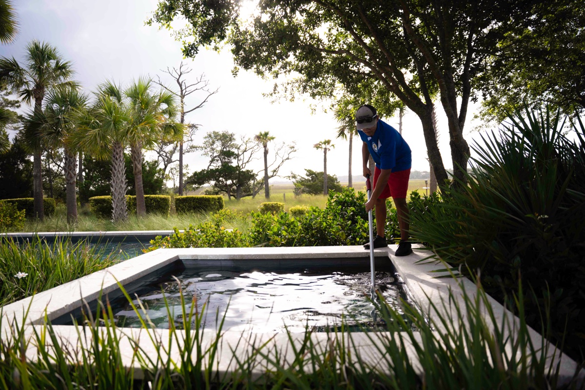 Pool technician cleaning a spa on Kiawah Island, SC